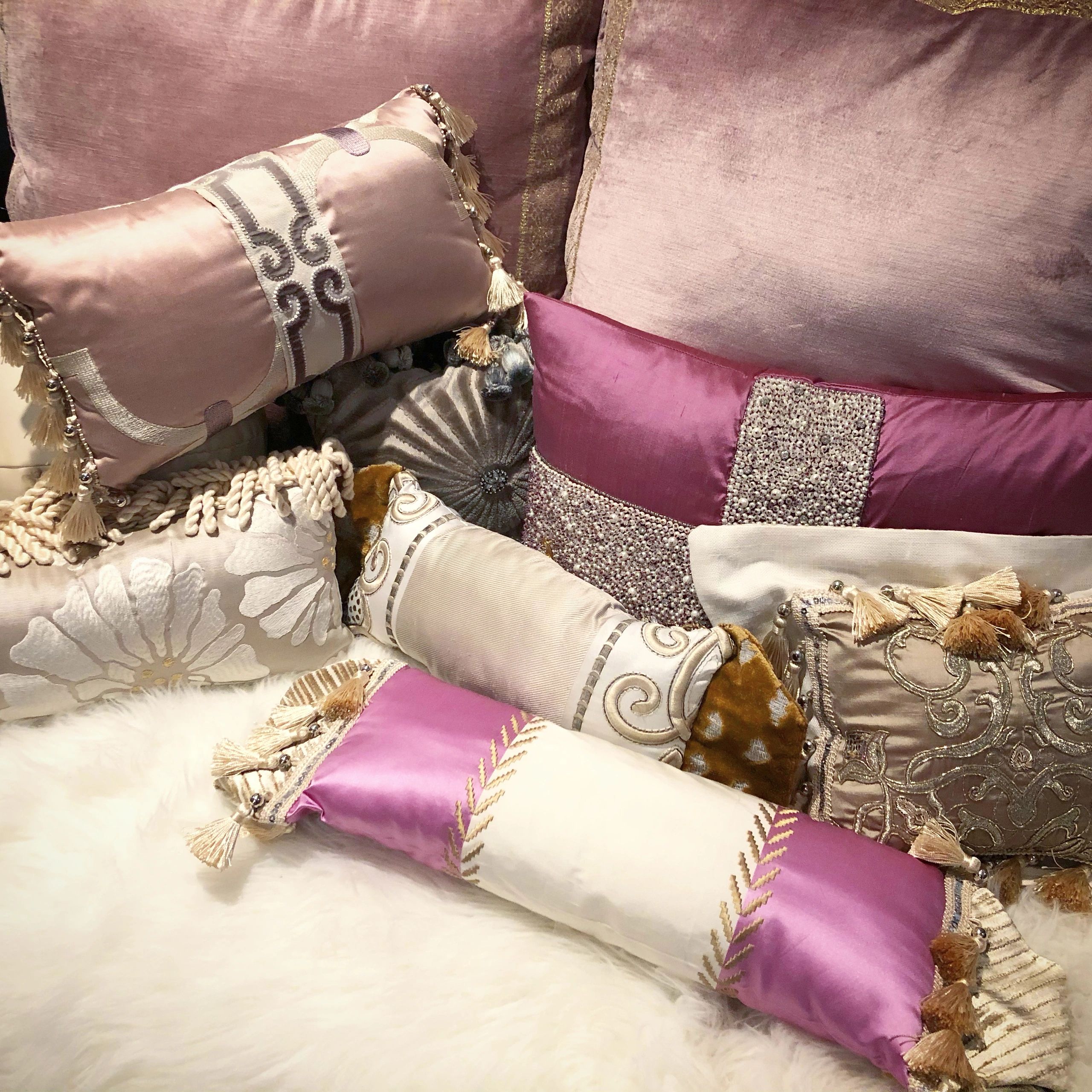 Decorative mauve and pink throw pillows